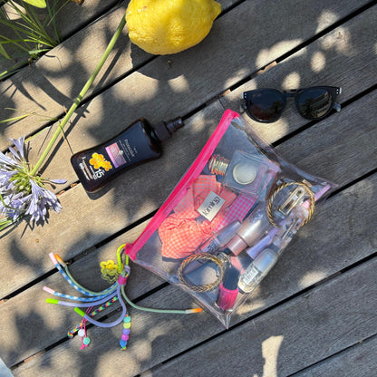 Clear PVC travel pouch | Flat Transparent Makeup Bag with Neon Pink Zipper