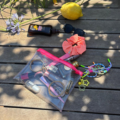 Clear PVC travel pouch | Flat Transparent Makeup Bag with Neon Pink Zipper