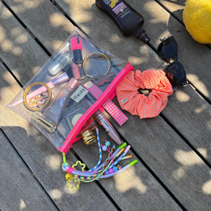 Clear PVC travel pouch | Flat Transparent Makeup Bag with Neon Pink Zipper